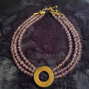 Beautiful purple gold necklace.